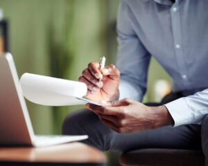 counselor-taking-notes-during-online-session-2022-05-01-23-00-32-utc-1920w-1024×683-1