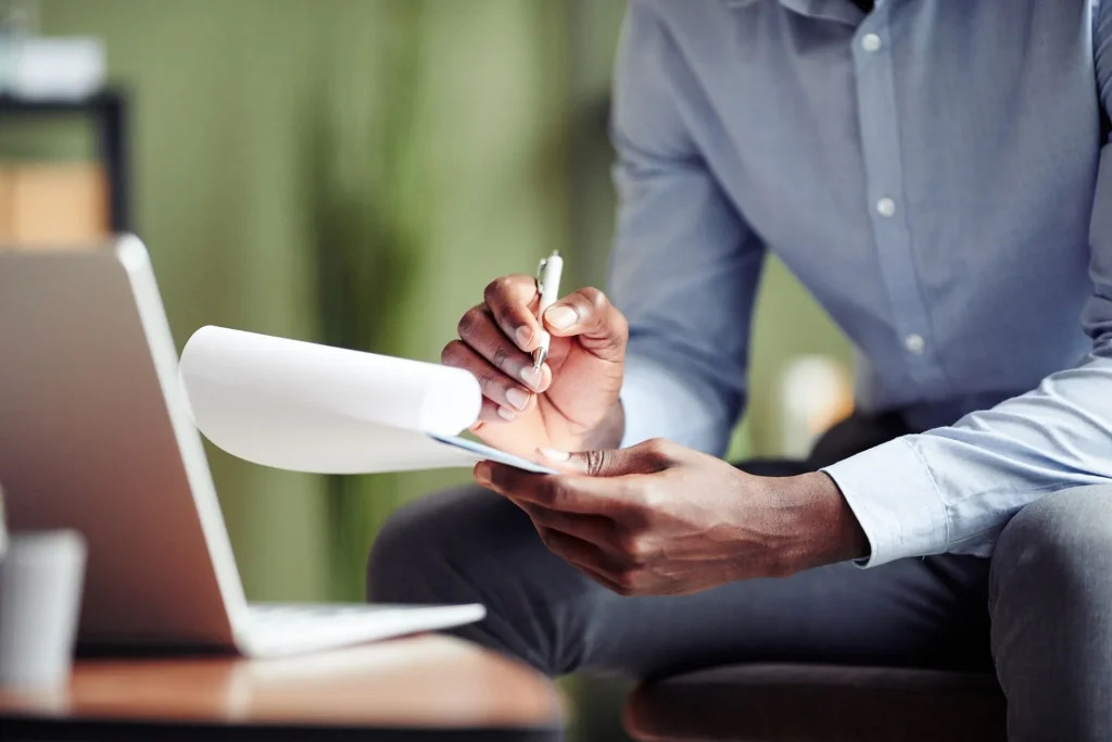 counselor-taking-notes-during-online-session-2022-05-01-23-00-32-utc-1920w-1024×683-1