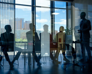 silhouetted-business-team-meeting-in-modern-office-2026-01-05-23-12-19-utc